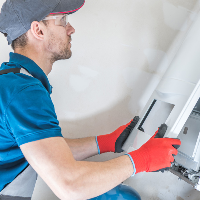 Wall unit maintenance as part of AC repairing services